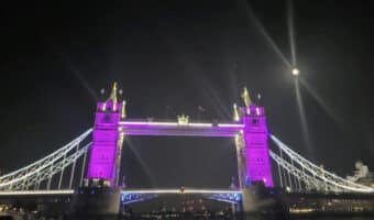 London's Tower Bridge was lit up in purple in honor of Queen Elizabeth who passed away at age 96 on Sept. 8, 2022