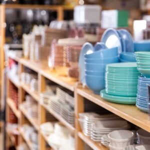 Store selling pastel color bowls, dishes, cups on shop